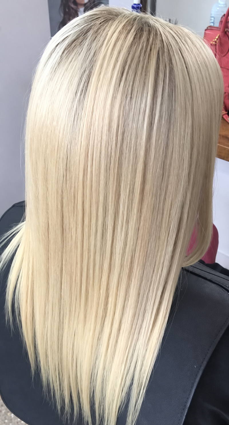 The same blonde hair after the Novak full keratin treatment
